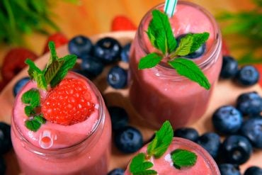 High-protein berry smoothie in a glass, built to keep women over 50 full for hours