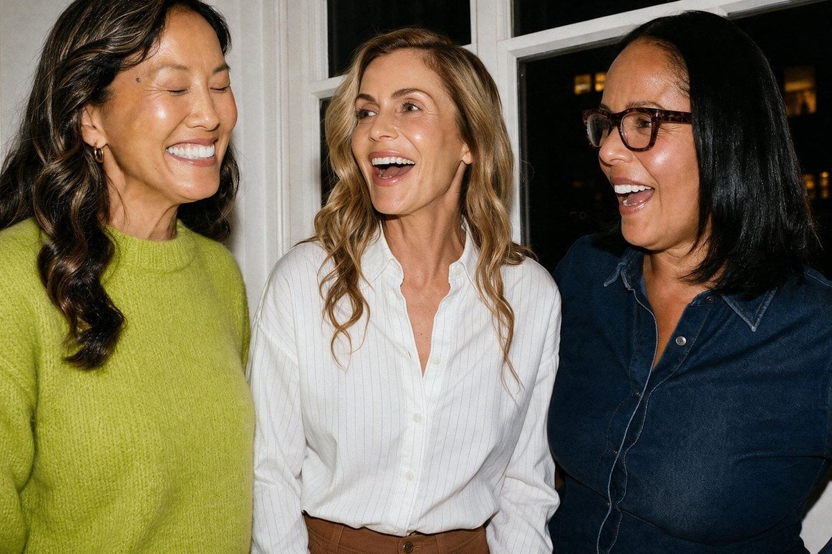 Three women laughing together, from Midi Health