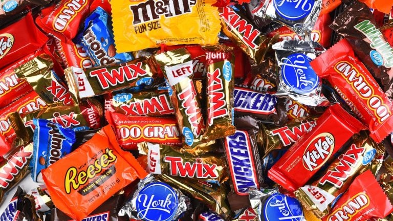 A large pile of fun size Halloween candy bars
